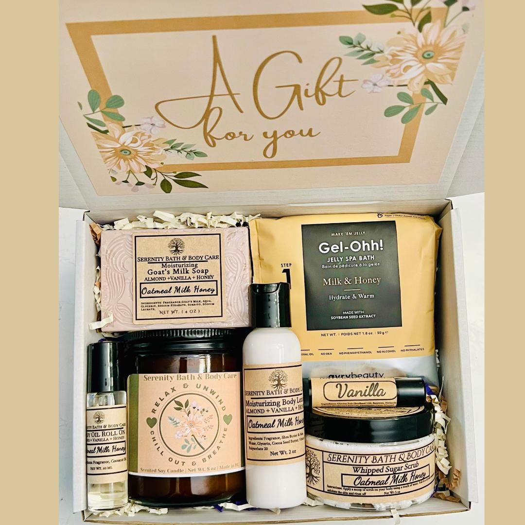 Self care spa gift box for women with candle, soap, body lotion, sugar scrub, essential oil roll-on, and milk & honey bath — perfect birthday or Christmas relaxation gift.
