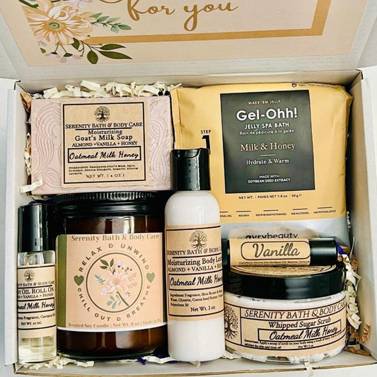Self care spa gift box for women with candle, soap, body lotion, sugar scrub, essential oil roll-on, and milk & honey bath — perfect birthday or Christmas relaxation gift. 